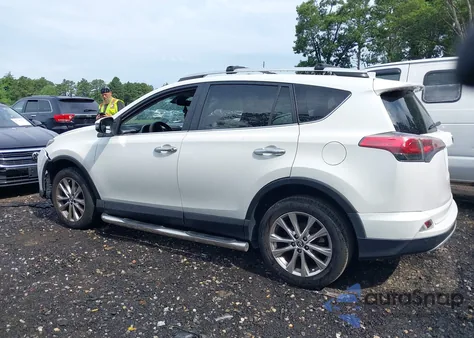2016 Toyota Rav4 Limited z USA, uszkodzony, nr VIN 2T3DFREV6GW537552